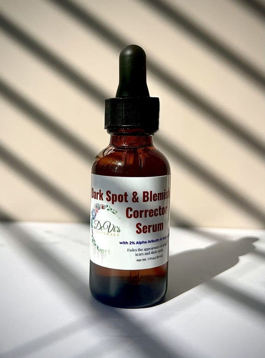 Brown glass serum bottle with dropper labeled 'Dark Spot & Blemish Corrector Serum' on a light background.