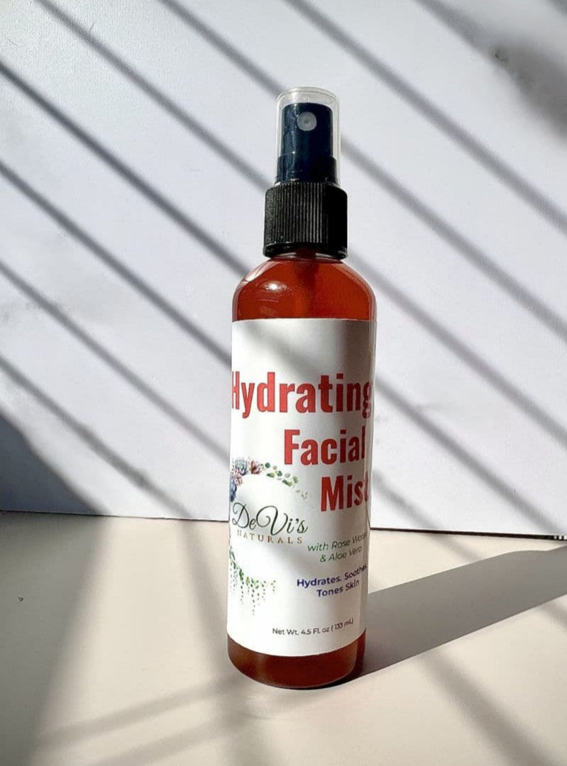 Hydrating Facial Mist bottle on a white surface with a white wall background