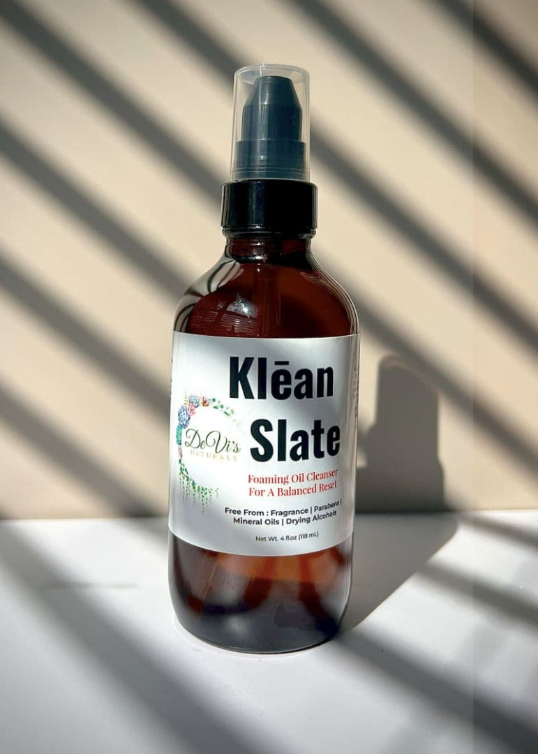 Klean Slate bottle with label on a surface with shadows