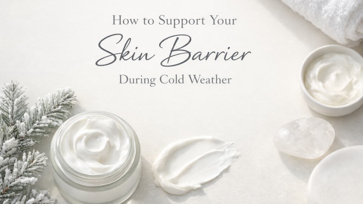Cosmetic jars with cream on a white surface with text about supporting skin barrier during cold weather.