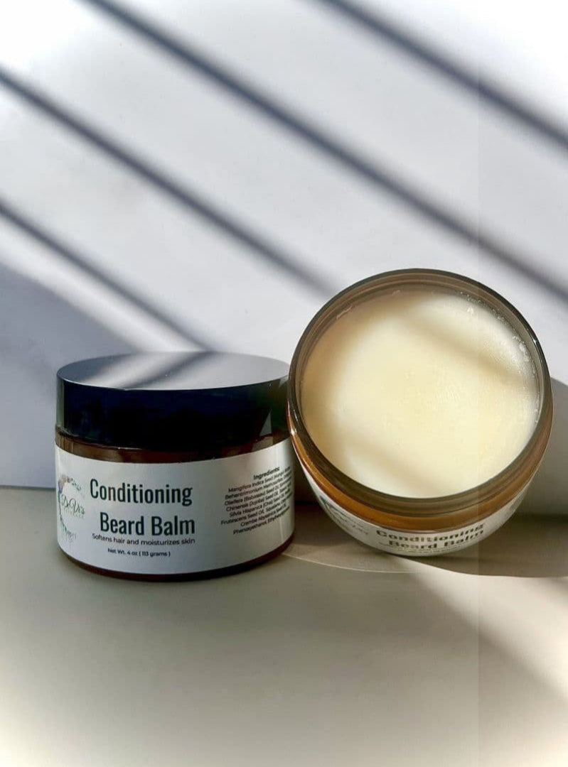 Two jars of Conditioning Beard Balm on a light surface with a neutral background