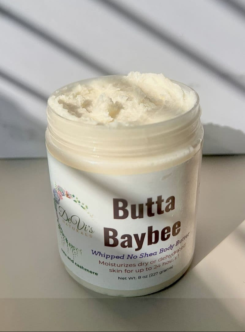 Jar of Butta Baybee whipped no shea body butter on a neutral background